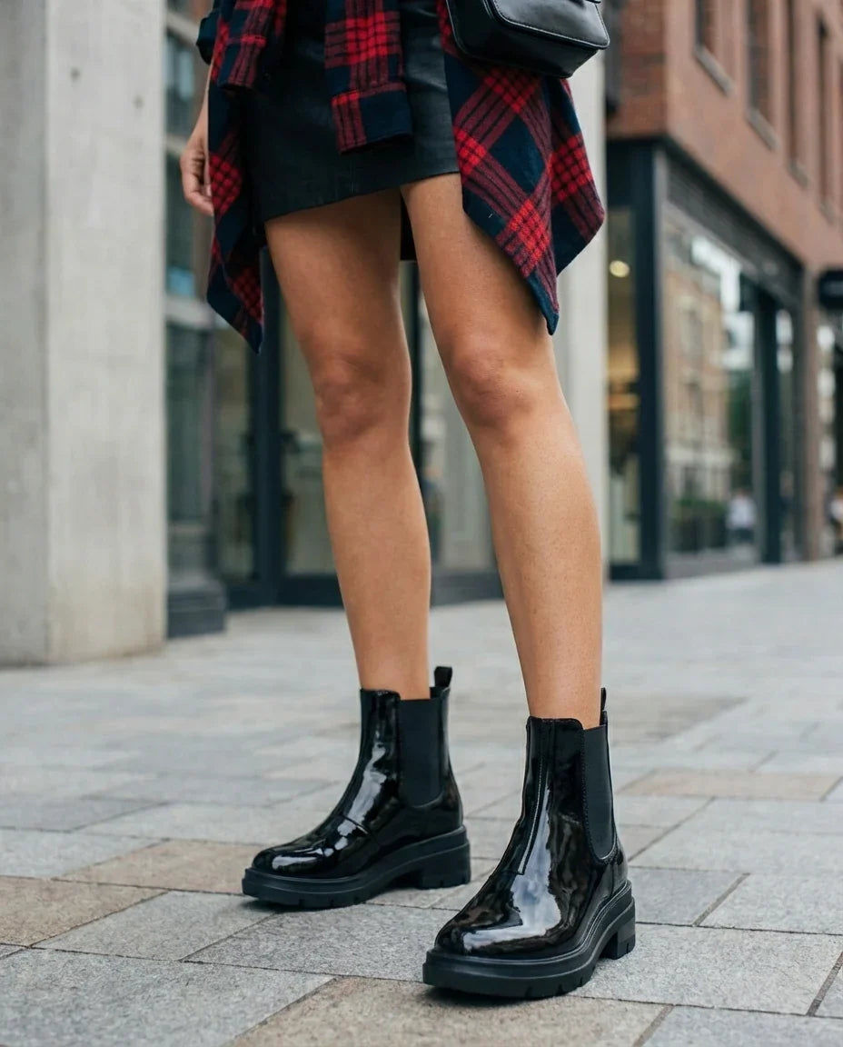 Stuart Weitzman Norah Patent Lug-Sole Ankle Booties