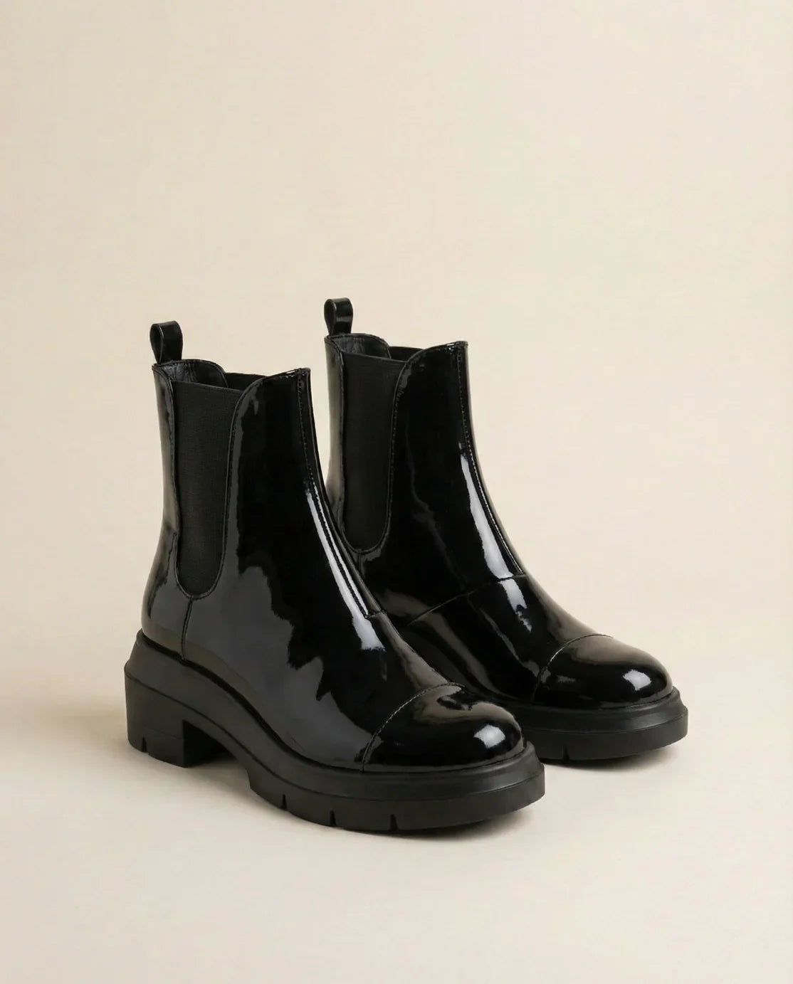 Stuart Weitzman Norah Patent Lug-Sole Ankle Booties