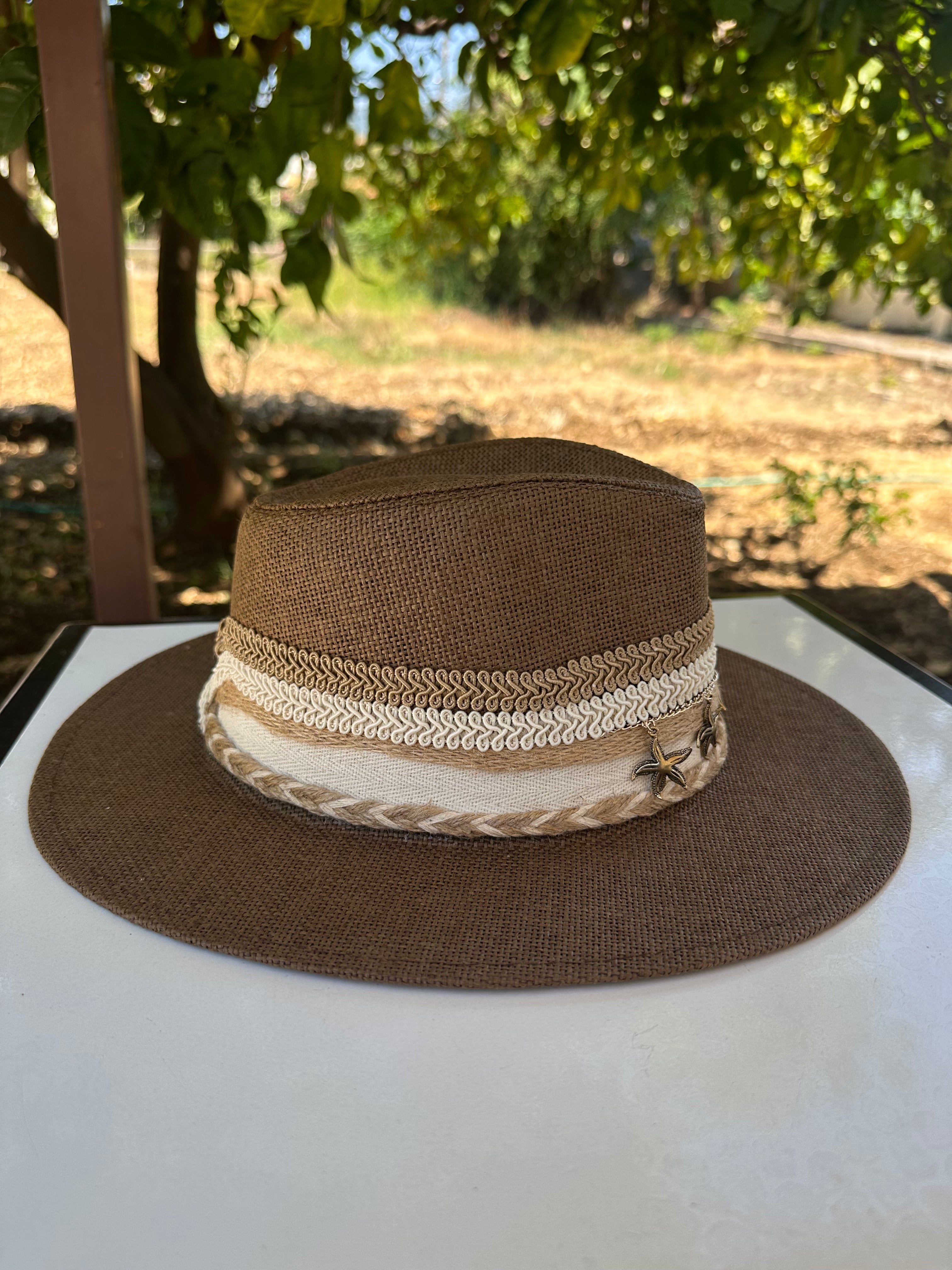 By Rita Raphael Brown Starfish Charm Straw Hat