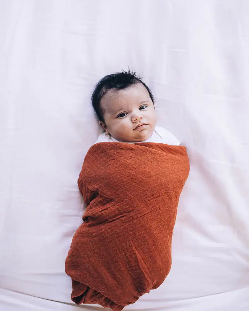 Little Unicorn - Cotton Muslin Swaddle -Rust