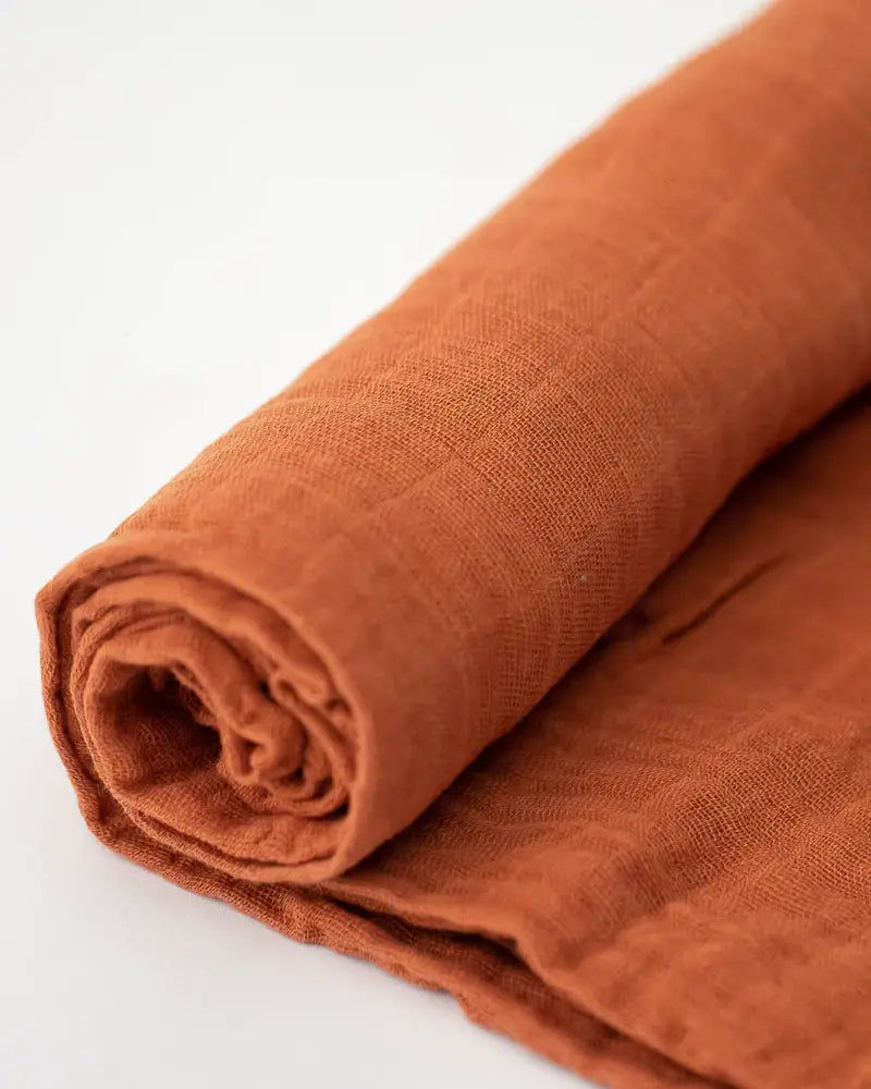 Little Unicorn - Cotton Muslin Swaddle -Rust