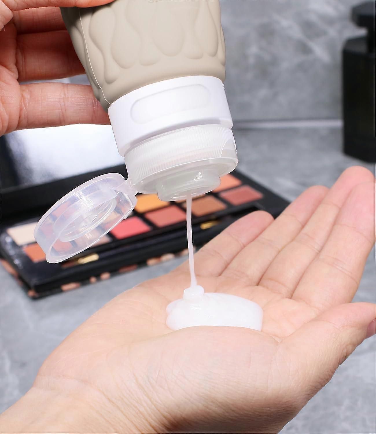 4 Pack Leakproof Silicone Travel Bottles Set with Toiletry Bag