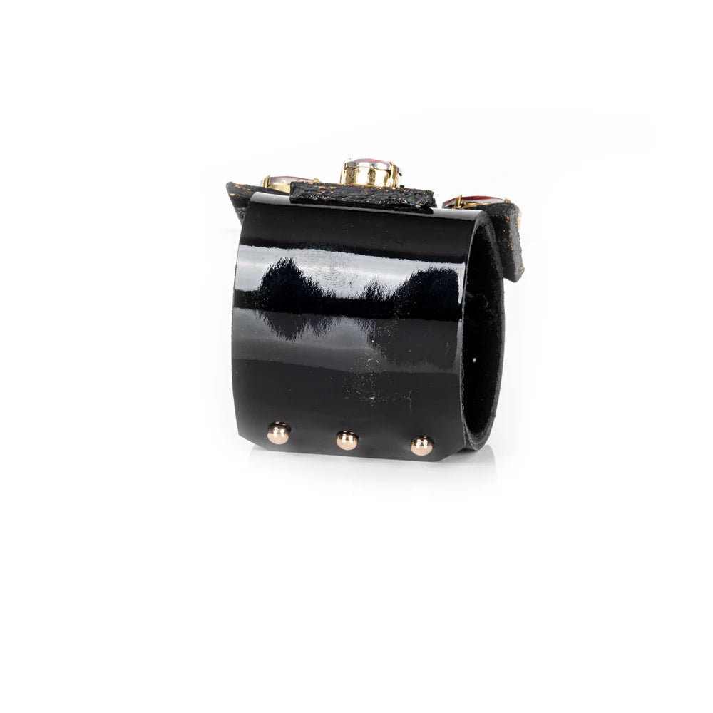 The Dark Black Leather Crystal Star Cuff Bracelet with Red Stones