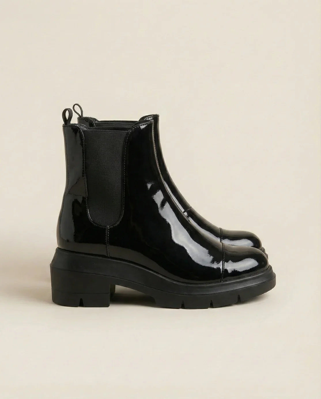 Stuart Weitzman Norah Patent Lug-Sole Ankle Booties