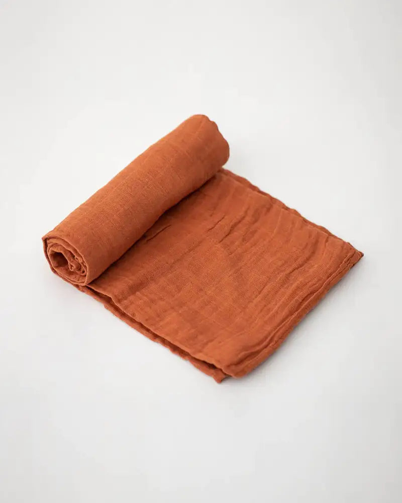 Little Unicorn - Cotton Muslin Swaddle -Rust