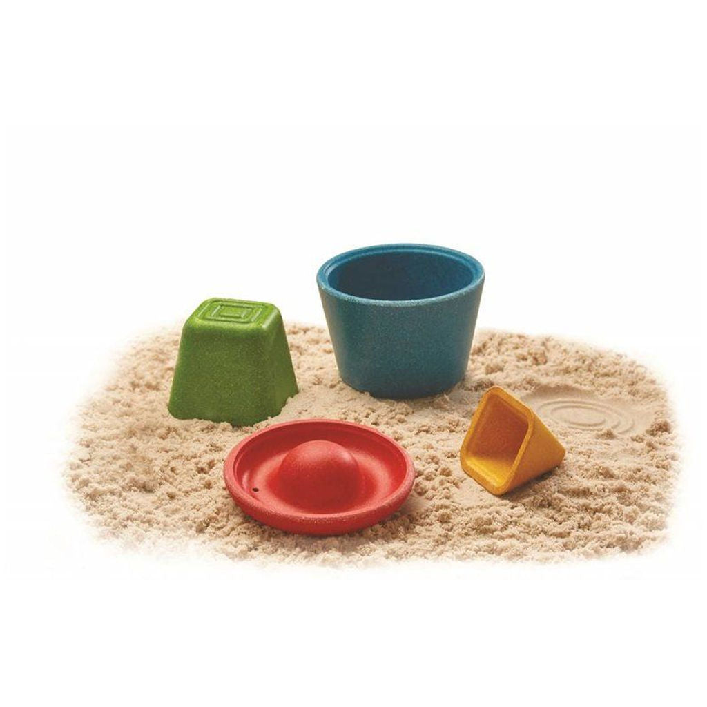 PlanToys: اللعب الإبداعي بالرمل — قوالب رمل خشبية